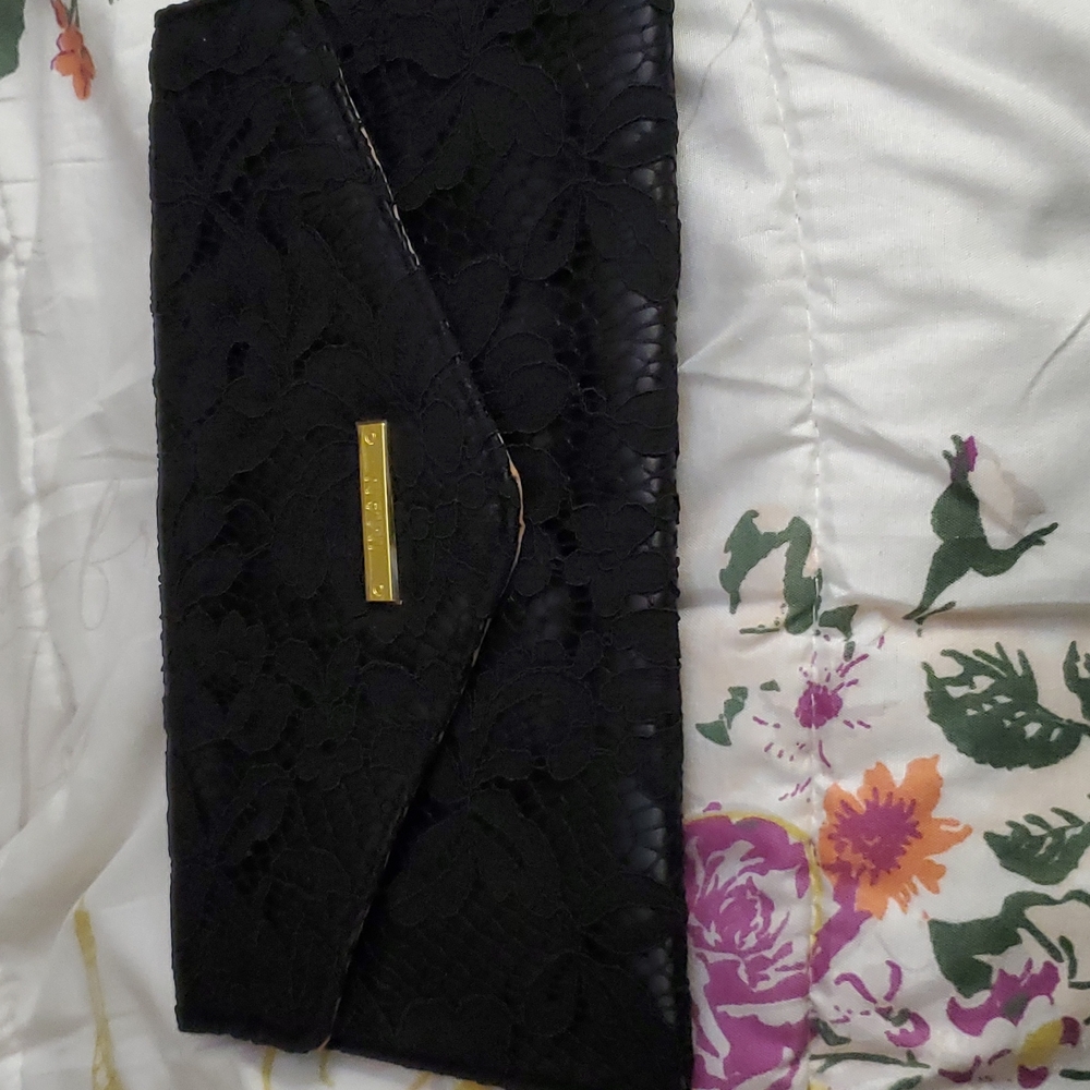Ladies black clutch handbag